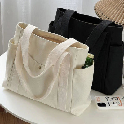 sac a langer fourre tout blanc noir