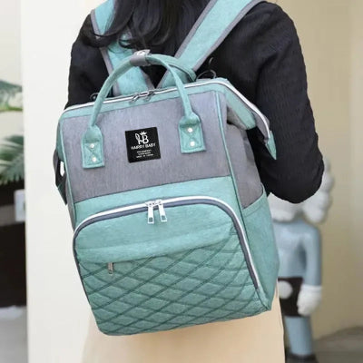 sac a langer porter au dos vert