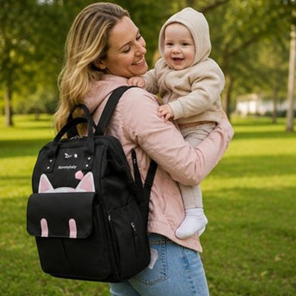 Sac dos a langer maman porte bebe dans les bras